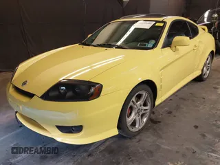 2006 Hyundai Tiburon GT z VIN KMHHN65F56U225936, wystawiony jako IAAI lot #41695280 z przebiegiem 121 110 mil mil oraz . Historia ofert i sprzedaży dostępna na DreamBid. Obrazek 18.
