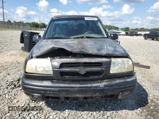 2000 Suzuki Vitara JLS z VIN 2S3TC52CXY6106646, wystawiony jako Copart lot #72450524 z przebiegiem 167 812 mil mil oraz Szkody całkowita. Historia ofert i sprzedaży dostępna na DreamBid. Obrazek 5.