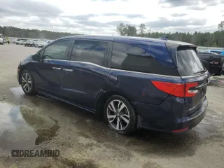 2021 Honda Odyssey Touring with VIN 5FNRL6H83MB028717, listed as a Copart auction lot 49236485 with 63,576 mi miles and Salvage Title. Bid and sale history available at carsss.com. Image 2.