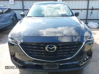 2023 Mazda CX-9 Touring Plus with VIN JM3TCBAY2P0657761, listed as a IAAI auction lot 41125586 with 12,425 mi miles and . Bid and sale history available at DreamBid. Image 13.