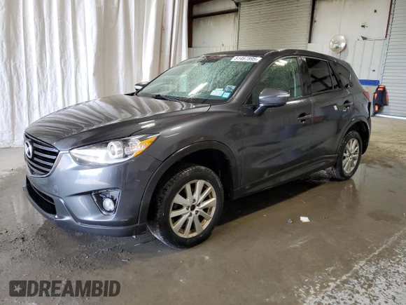 2016 Mazda CX-5 Touring with VIN JM3KE4CY3G0716346, listed as a Copart auction lot 51467895 with 133,218 mi miles and Salvage Title. Bid and sale history available at carsss.com. Image 1.