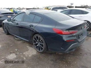 2021 BMW 8 Series M850i with VIN WBAGV8C03MCG68700, listed as a IAAI auction lot 41684696 with 18,516 mi miles. Bid and sale history available at carsss.com. Image 3.