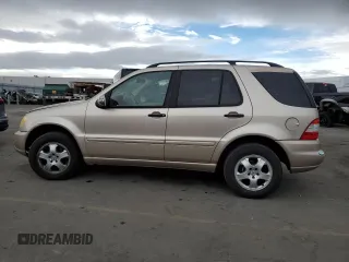 2002 Mercedes-Benz M-Class with VIN 4JGAB54E32A363452, listed as a Copart auction lot 81743994 with 147,376 mi miles and Salvage Title. Bid and sale history available at carsss.com. Image 2.