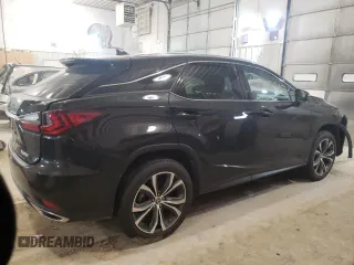2022 Lexus RX with VIN 2T2HZMDA7NC331251, listed as a Copart auction lot 69643512 with 15,088 mi miles. Bid and sale history available at carsss.com. Image 3.