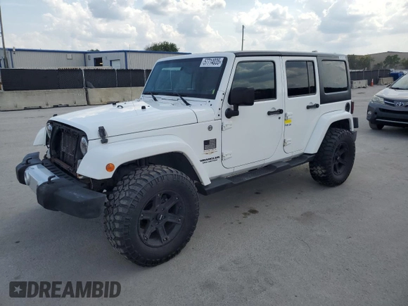 2013 Jeep Wrangler Unlimited Sahara with VIN 1C4BJWEG4DL536694, listed as a Copart auction lot 57714035 with 146,257 mi miles and Salvage title. Bid and sale history available at DreamBid. Image 1.