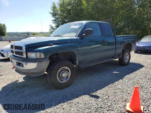 1999 Dodge 2500 with VIN 1B7KF23W2XJ539940, listed as a Copart auction lot 64237595 with 211,718 mi miles and Salvage title. Bid and sale history available at DreamBid. Image 1.
