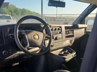 2013 Chevrolet Express Cargo with VIN 1GCWGFCA3D1147507, listed as a IAAI auction lot 42821437 with 234,091 mi miles and . Bid and sale history available at DreamBid. Image 6.