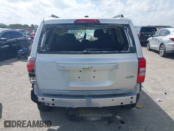 2013 Jeep Patriot Latitude with VIN 1C4NJPFA1DD260398, listed as a IAAI auction lot 41726749 with 146,609 mi miles. Bid and sale history available at carsss.com. Image 16.
