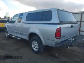 1998 Ford F-150 with VIN 2FTZX18W5WCA42375, listed as a IAAI auction lot 41724649 with 71,034 mi miles and . Bid and sale history available at DreamBid. Image 3.