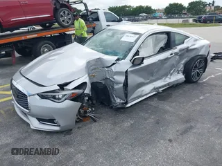 2020 Infiniti Q60 Luxe with VIN JN1EV7EK5LM340383, listed as a IAAI auction lot 40920550 with 59,690 mi miles and . Bid and sale history available at carsss.com. Image 2.