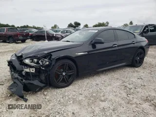 2015 BMW 6 Series 640i xDrive z VIN WBA6B8C56FD453645, wystawiony jako Copart lot #68532103 z przebiegiem Nie podano mil oraz Szkoda całkowita • Salvage title. Historia ofert i sprzedaży dostępna na DreamBid. Obrazek 1.