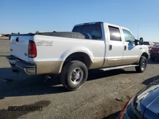 2000 Ford Super Duty F-250 XL with VIN 1FTNW21S1YED65639, listed as a Copart auction lot 74377194 with 158,387 mi miles and Salvage Title. Bid and sale history available at carsss.com. Image 3.