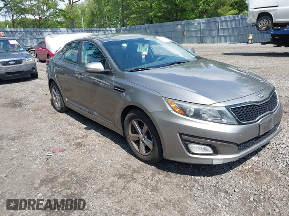 2015 Kia Optima LX z VIN 5XXGM4A73FG375345, wystawiony jako IAAI lot #42373557 z przebiegiem 180 029 mil mil oraz . Historia ofert i sprzedaży dostępna na DreamBid. Obrazek 1.