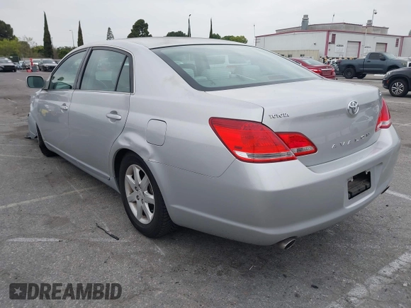 2005 Toyota Avalon XL with VIN 4T1BK36B25U036071, listed as a IAAI auction lot 42100456 with 185,898 mi miles and . Bid and sale history available at carsss.com. Image 3.
