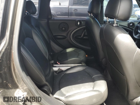 2011 MINI Countryman S with VIN WMWZC5C5XBWL55516, listed as a Copart auction lot 63239235 with 137,545 mi miles and Salvage title. Bid and sale history available at DreamBid. Image 10.