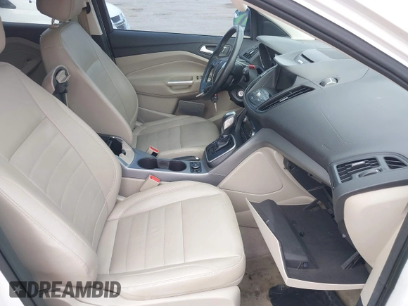 2014 Ford Escape SE with VIN 1FMCU9GX9EUB15944, listed as a IAAI auction lot 42110269 with 120,297 mi miles and . Bid and sale history available at DreamBid. Image 5.