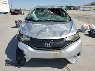 2016 Honda Fit LX with VIN JHMGK5H5XGX020620, listed as a Copart auction lot 60337295 with 103,827 mi miles and Salvage title. Bid and sale history available at DreamBid. Image 5.