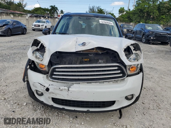 2013 MINI Countryman with VIN WMWZB3C5XDWM31715, listed as a Copart auction lot 57028565 with 95,453 mi miles and Salvage title. Bid and sale history available at DreamBid. Image 5.
