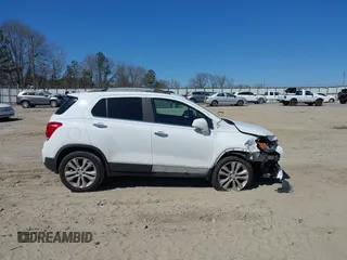2017 Chevrolet Trax LT with VIN KL7CJRSB9HB084197, listed as a IAAI auction lot 41707414 with 91,666 mi miles and . Bid and sale history available at carsss.com. Image 14.