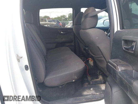 2018 Toyota Tacoma SR with VIN 3TMCZ5AN6JM138747, listed as a IAAI auction lot 42684725 with 144,725 mi miles and . Bid and sale history available at DreamBid. Image 8.