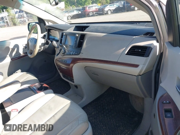 2012 Toyota Sienna XLE with VIN 5TDDK3DC6CS044409, listed as a IAAI auction lot 42409389 with 231,567 mi miles and . Bid and sale history available at DreamBid. Image 5.