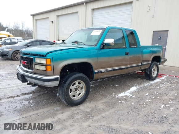 1994 GMC Sierra 1500 with VIN 2GDEK19K2R1549660, listed as a IAAI auction lot 41615642 with 207,399 mi miles and . Bid and sale history available at DreamBid. Image 2.