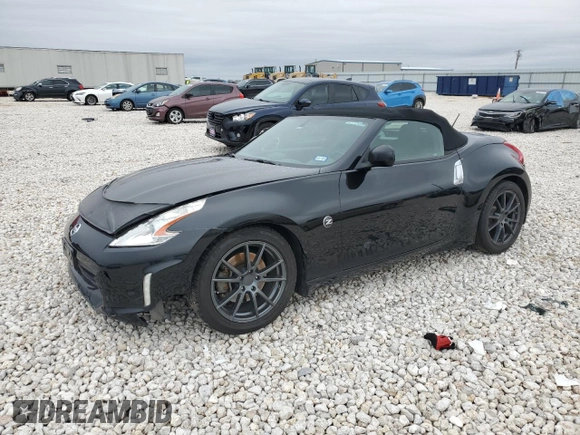 2014 Nissan 370Z Touring with VIN JN1AZ4FH1EM620177, listed as a Copart auction lot 42581255 with 106,957 mi miles and Salvage Title. Bid and sale history available at DreamBid. Image 1.