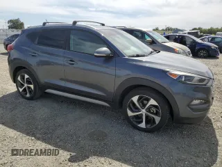 2017 Hyundai Tucson Value z VIN KM8J33A28HU390391, wystawiony jako Copart lot #56764455 z przebiegiem 110 616 mil mil oraz Czysty tytuł • Clean title. Historia ofert i sprzedaży dostępna na DreamBid. Obrazek 4.