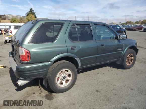 2004 Isuzu Rodeo S with VIN 4S2CK58W344303242, listed as a Copart auction lot 75339714 with 106,659 mi miles and Salvage title. Bid and sale history available at DreamBid. Image 3.