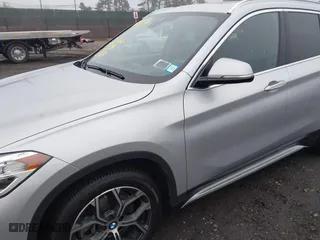 2021 BMW X1 xDrive28i with VIN WBXJG9C04M5T79810, listed as a IAAI auction lot 41471536 with 75,345 mi miles. Bid and sale history available at carsss.com. Image 6.