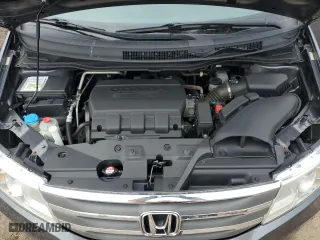 2012 Honda Odyssey EX-L with VIN 5FNRL5H61CB508181, listed as a Copart auction lot 52174205 with 203,763 mi miles and Salvage Title. Bid and sale history available at carsss.com. Image 12.