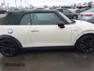 2016 MINI Convertible S z VIN WMWWG9C52G3C21934, wystawiony jako IAAI lot #41569029 z przebiegiem 102 042 mil mil oraz . Historia ofert i sprzedaży dostępna na DreamBid. Obrazek 14.