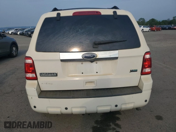 2010 Ford Escape Limited z VIN 1FMCU0EG4AKB30517, wystawiony jako Copart lot #59870285 z przebiegiem 126 483 mil mil oraz Czysty tytuł • Clean title. Historia ofert i sprzedaży dostępna na DreamBid. Obrazek 6.