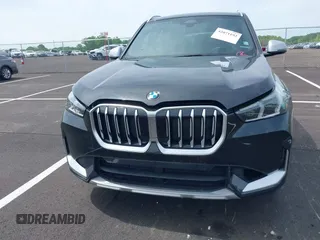 2023 BMW X1 xDrive28i with VIN WBX73EF03P5W15295, listed as a IAAI auction lot 42071192 with 23,326 mi miles and . Bid and sale history available at DreamBid. Image 12.