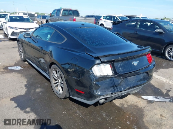 2015 Ford Mustang EcoBoost z VIN 1FA6P8TH4F5377048, wystawiony jako IAAI lot #42234256 z przebiegiem 160 455 mil mil oraz . Historia ofert i sprzedaży dostępna na DreamBid. Obrazek 3.
