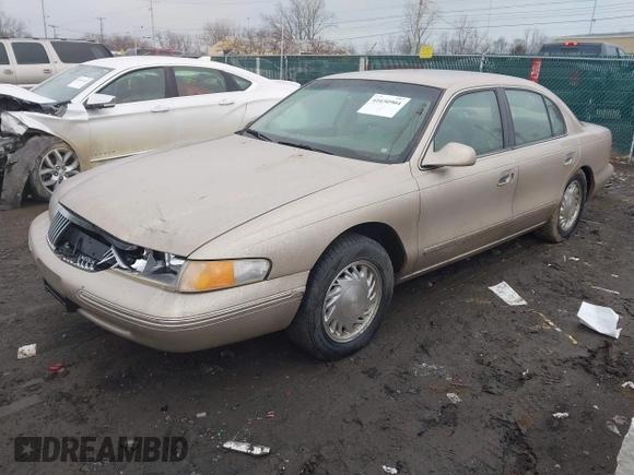 1997 Lincoln Continental with VIN 1LNLM97V3VY666104, listed as a IAAI auction lot 41650904 with 181,536 mi miles. Bid and sale history available at carsss.com. Image 17.