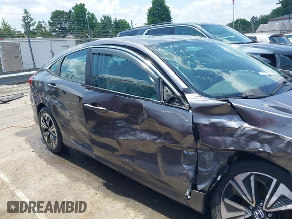 2016 Honda Civic EX-L with VIN 19XFC1F77GE201469, listed as a IAAI auction lot 42441617 with 67,803 mi miles and . Bid and sale history available at DreamBid. Image 13.