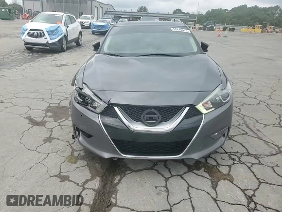 2017 Nissan Maxima SV z VIN 1N4AA6AP8HC457395, wystawiony jako Copart lot #58840075 z przebiegiem 161 551 mil mil oraz Szkoda całkowita • Salvage title. Historia ofert i sprzedaży dostępna na DreamBid. Obrazek 13.