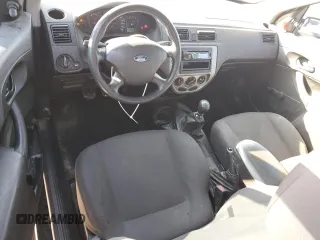 2007 Ford Focus S with VIN 1FAFP31N27W201266, listed as a Copart auction lot 51789625 with 211,274 mi miles and Salvage Title. Bid and sale history available at DreamBid. Image 8.