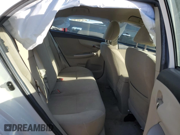 2012 Toyota Corolla L with VIN 5YFBU4EE2CP015053, listed as a Copart auction lot 73664694 with 0 mi miles and Salvage Title. Bid and sale history available at carsss.com. Image 10.