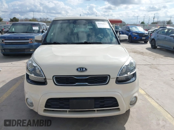2012 Kia Soul + with VIN KNDJT2A63C7462882, listed as a IAAI auction lot 41162839 with 102,904 mi miles. Bid and sale history available at carsss.com. Image 12.