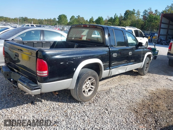 2003 Dodge Dakota SLT with VIN 1D7HL48X93S151422, listed as a IAAI auction lot 40661577 with 238,586 mi miles. Bid and sale history available at carsss.com. Image 4.