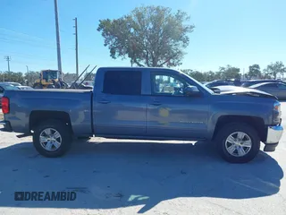 2016 Chevrolet Silverado 1500 LT with VIN 3GCUKREC8GG219524, listed as a IAAI auction lot 41087657 with 123,010 mi miles and . Bid and sale history available at DreamBid. Image 13.