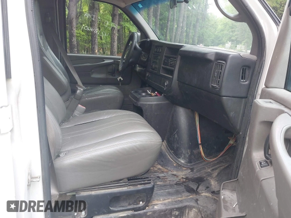 2014 Chevrolet Express Cargo with VIN 1GCWGFBA1E1210672, listed as a IAAI auction lot 42184397 with 174,364 mi miles and . Bid and sale history available at DreamBid. Image 5.
