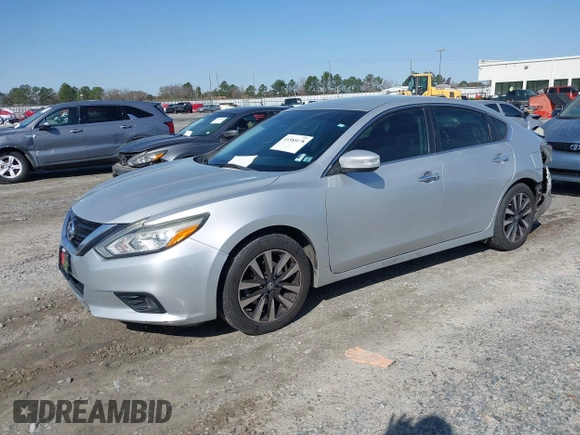 2018 Nissan Altima SR with VIN 1N4AL3AP6JC132730, listed as a IAAI auction lot 41585178 with 128,882 mi miles and . Bid and sale history available at DreamBid. Image 17.