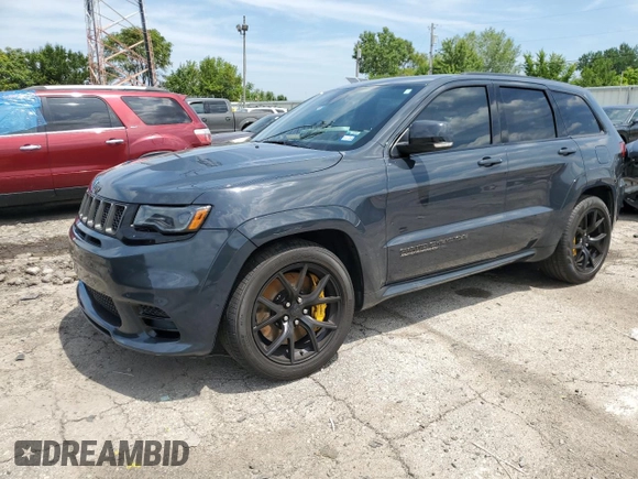 2018 Jeep Grand Cherokee Trackhawk with VIN 1C4RJFN99JC309254, listed as a Copart auction lot 64061615 with 104,558 mi miles and Clean title. Bid and sale history available at DreamBid. Image 1.