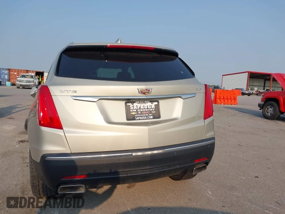 2017 Cadillac XT5 Premium Luxury FWD z VIN 1GYKNCRSXHZ164468, wystawiony jako IAAI lot #40314503 z przebiegiem 94 008 mil mil oraz . Historia ofert i sprzedaży dostępna na DreamBid. Obrazek 16.