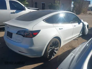 2021 Tesla Model 3 Performance with VIN 5YJ3E1EC6MF926448, listed as a IAAI auction lot 41240309 with 39,386 mi miles and . Bid and sale history available at DreamBid. Image 4.