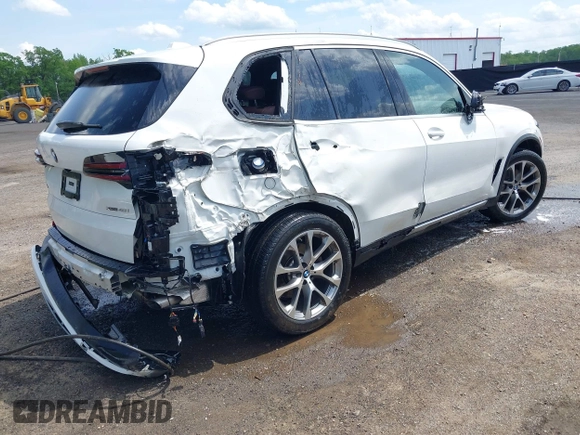 2024 BMW X5 xDrive40i with VIN 5UX23EU00R9V34355, listed as a IAAI auction lot 42135650 with 25,098 mi miles and . Bid and sale history available at DreamBid. Image 4.