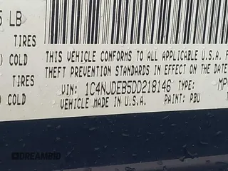 2013 Jeep Compass Latitude with VIN 1C4NJDEB5DD218146, listed as a IAAI auction lot 41849048 with 161,854 mi miles. Bid and sale history available at carsss.com. Image 9.